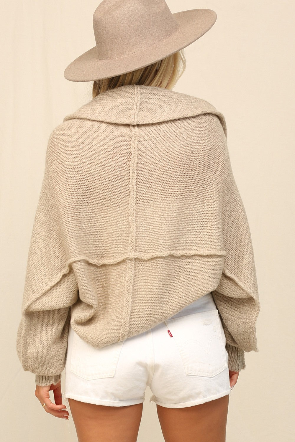| THE SHRUG IS FEATURED IN A SLOUCHY