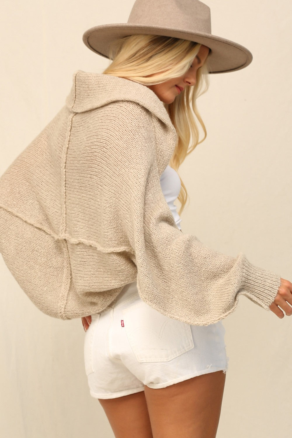 | THE SHRUG IS FEATURED IN A SLOUCHY