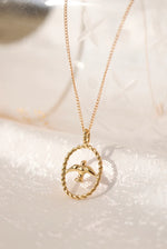 < The Olita Gold Necklace